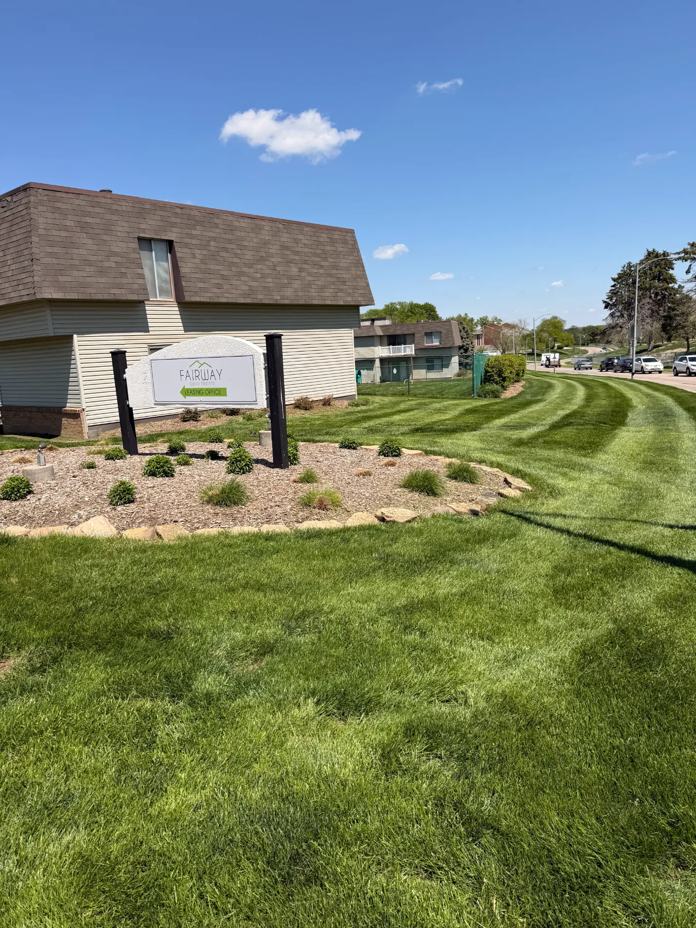 Striped commercial lawn at Fairway Apartments